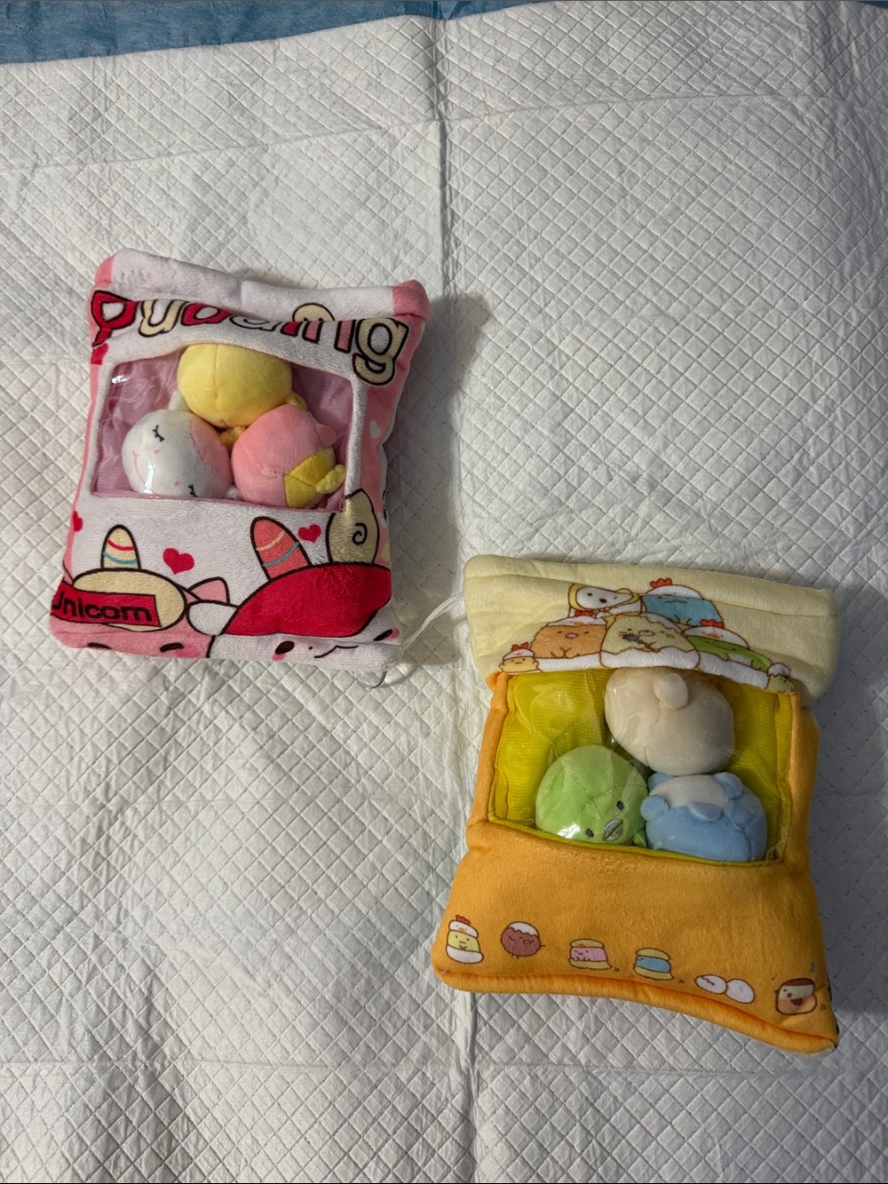 Set of Two Plush Character Pillows in Pink, Yellow, Green & Blue